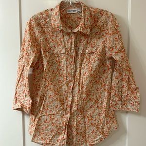 Women’s convertible 3/4 sleeve to short sleeve top.